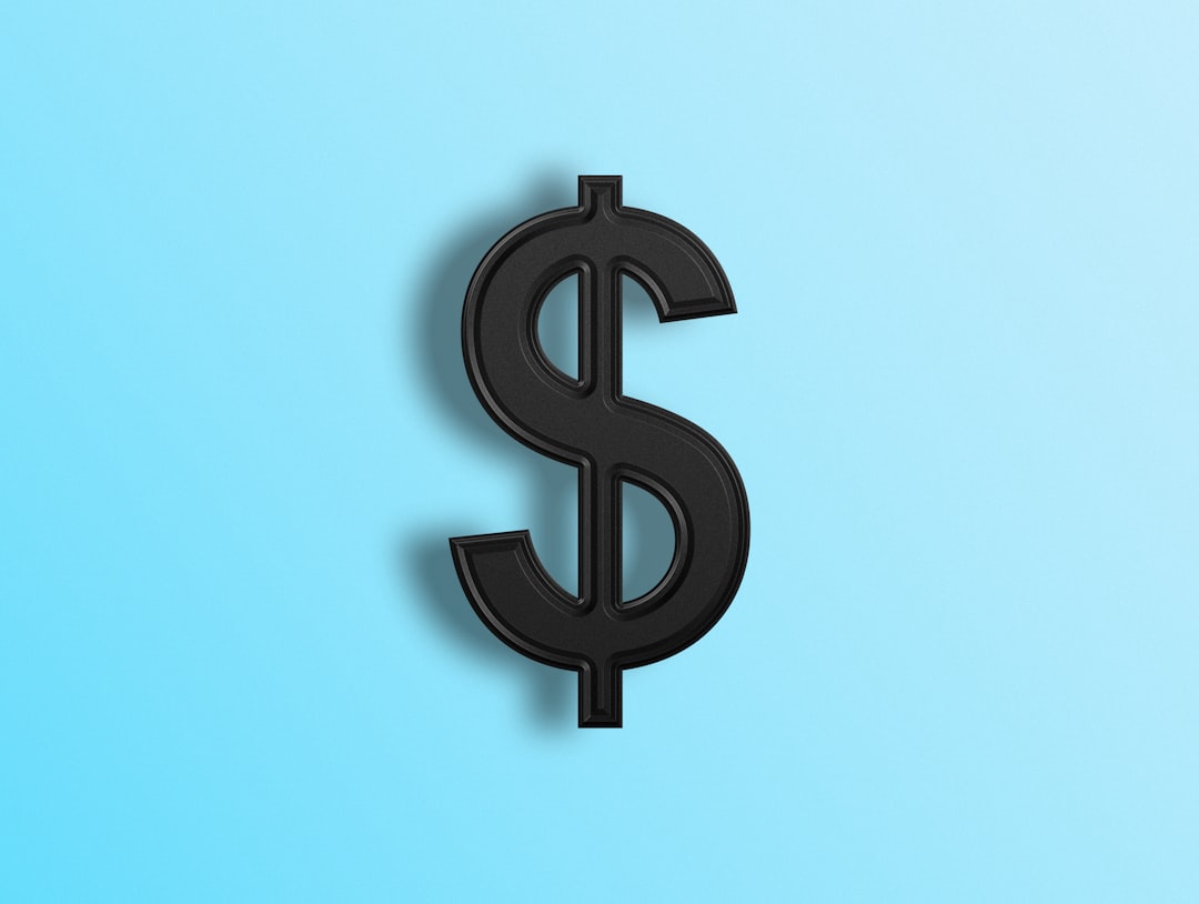 a-black-dollar-sign-on-a-blue-background-bubk6ge6ze0